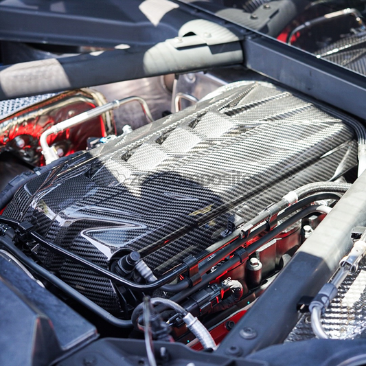 Carbon fiber engine cover replacement with Corvette emblem and diagonal weave pattern