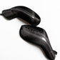 Two glossy black carbon fiber side mirror covers with a carbon weave pattern, displayed on a clean white background.