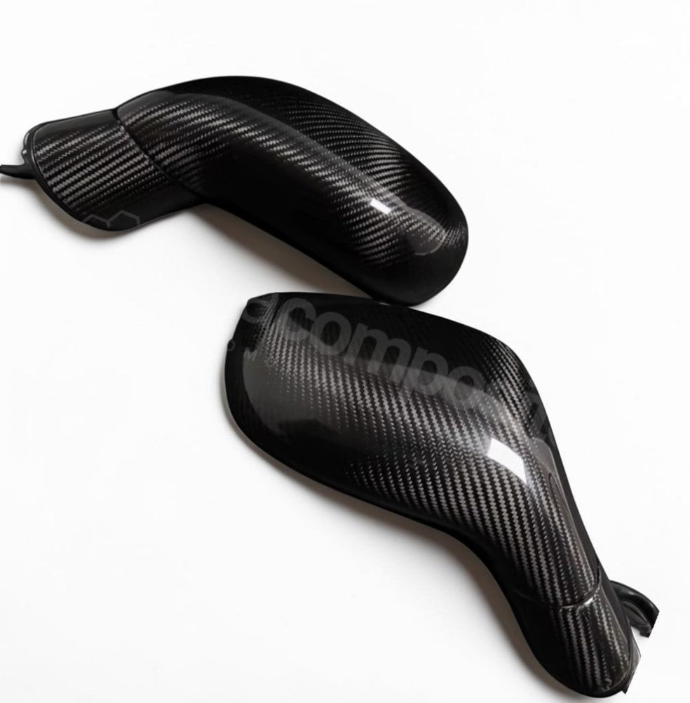 Two glossy black carbon fiber side mirror covers with a carbon weave pattern, displayed on a clean white background.