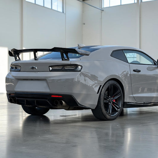 Camaro rear wing spoiler with carbon fiber finish, raised center section and supports