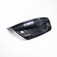 Carbon fiber trunk lid corner detail with vented openings and trim cutouts