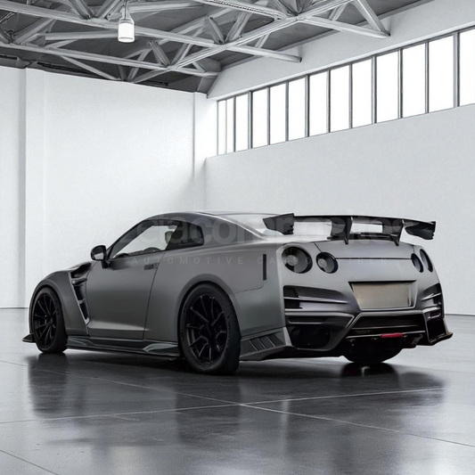 Gray sports car with carbon fiber-style rear spoiler and visible rear bumper details