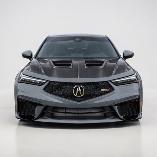 Acura Integra vented carbon fiber hood on dark gray car, two raised vent scoops