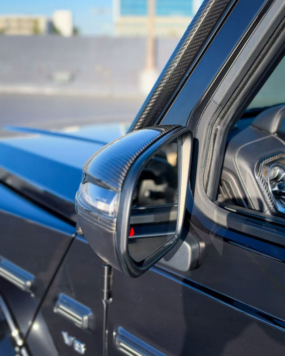Mercedes G-Class carbon fiber mirror cap cover on side mirror near door