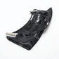 Underside of carbon fiber trunk panel, black weave with mounting holes